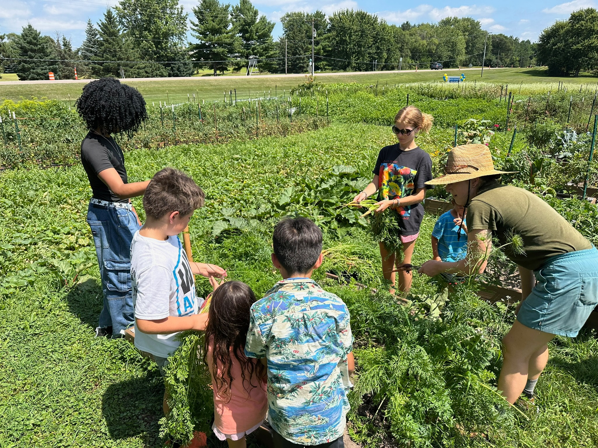 Kids in the cimarron community farm